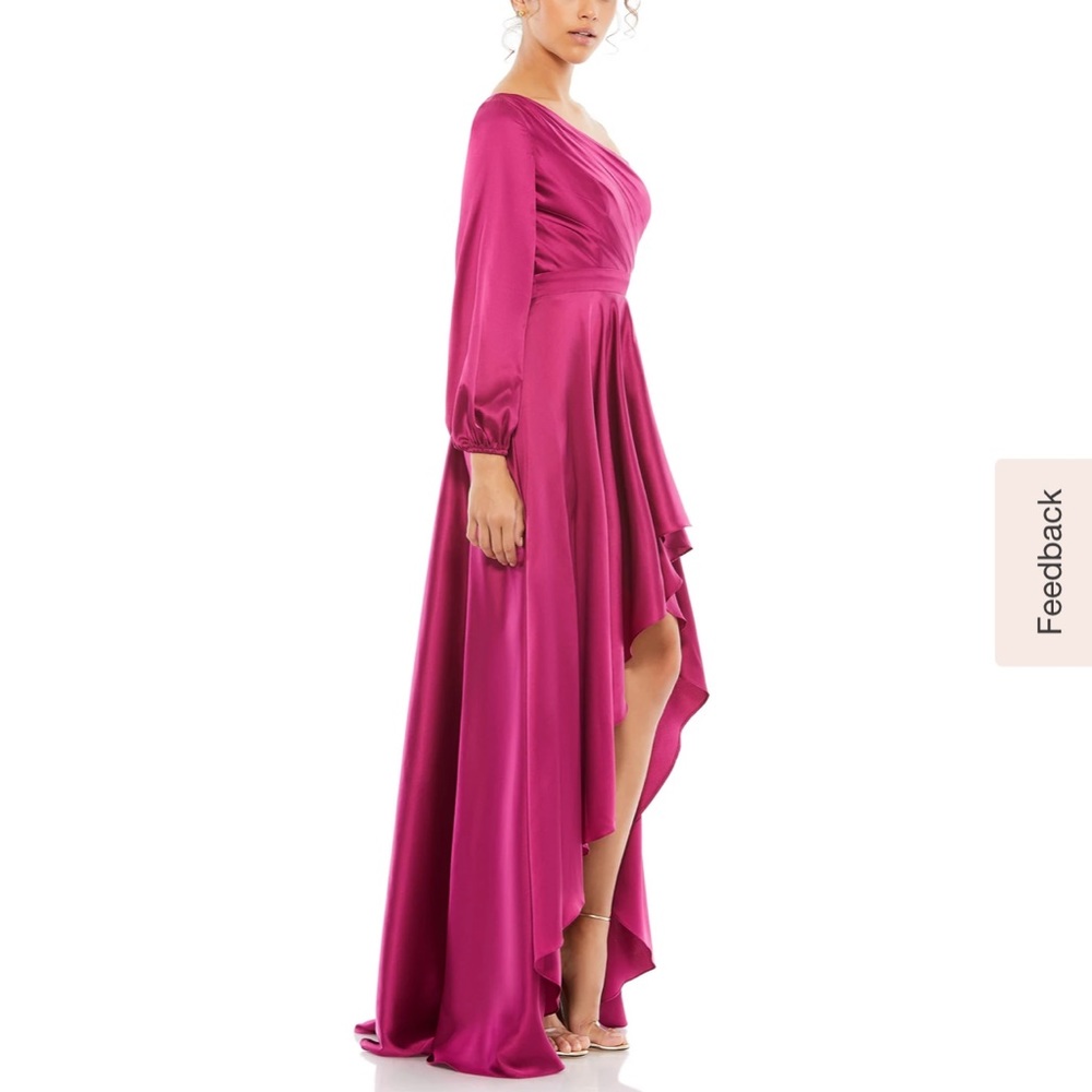 A gorgeous pink one should blouson sleeve high-gown. Ieena for Max Duggal.